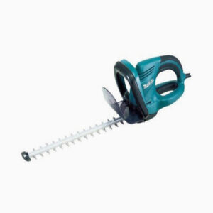 Makita electric hedge trimmer tool.
